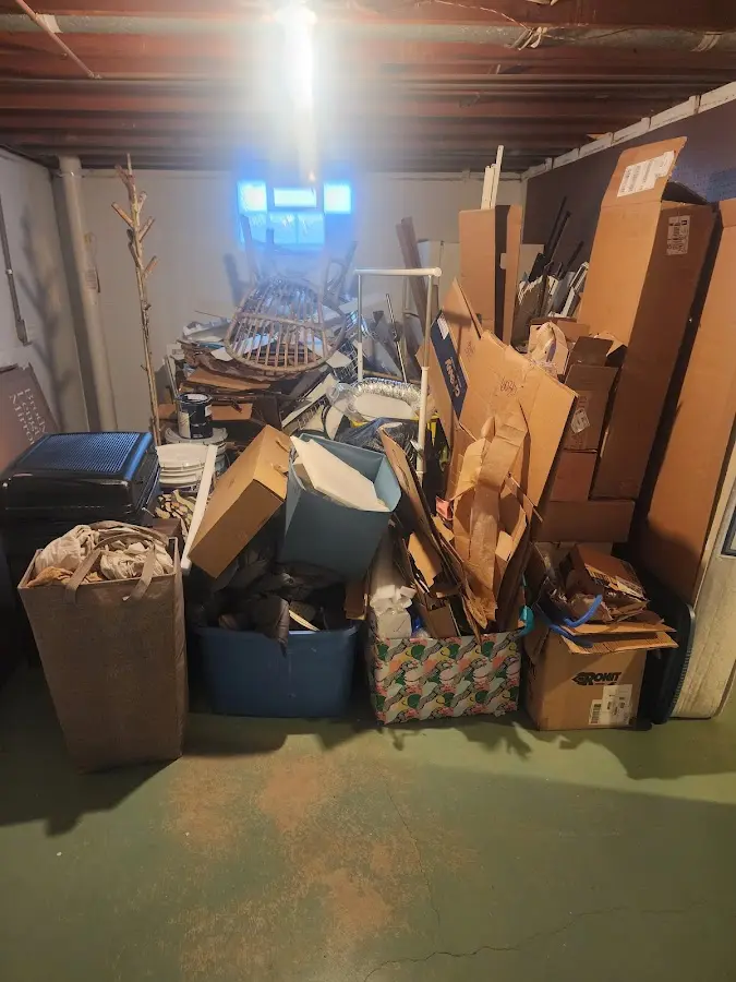 Roll-off dumpster container at job site for 8 Yard Dumpster Rental in Carthage